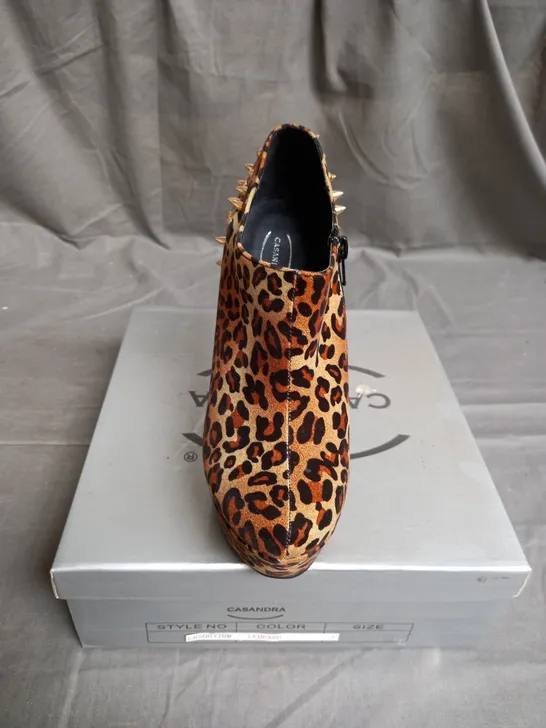 BOX OF 8 PAIRS OF CASSANDRA WEDGE ANKLE BOOTS IN LEOPARD WITH GOLD SPIKES - VARIOUS SIZES