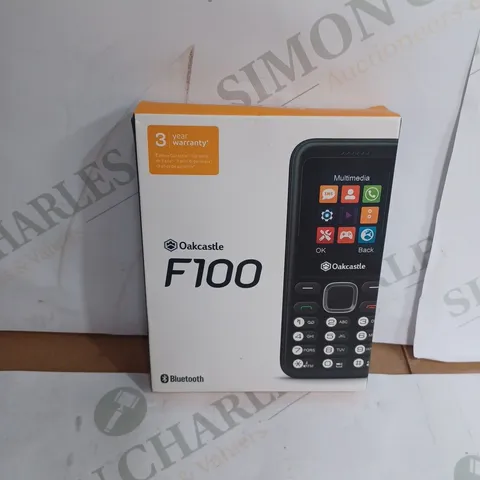 OAKCASLTE F100 TOUCHPAD MOBILE PHONE