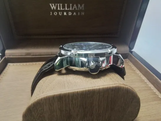 WILLIAM JOURDAIN STAINLESS STEEL GENTS CHRONOGRAPH WATCH WITH SKELETON BACK AND BLACK LEATHER STRAP IN WOODEN GIFT BOX