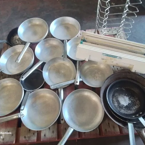 LARGE AMOUNT OF COMMERCIAL FRYING PANS AND STAINLESS STEEL PLATE RACK AND FOOD PACKAGING CUTTER