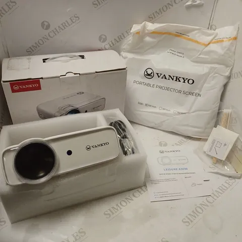 BOXED VANKYO PORTABLE PROJECTOR AND SCREEN WITH ACCESSORIES , CABLES AND MANUAL 