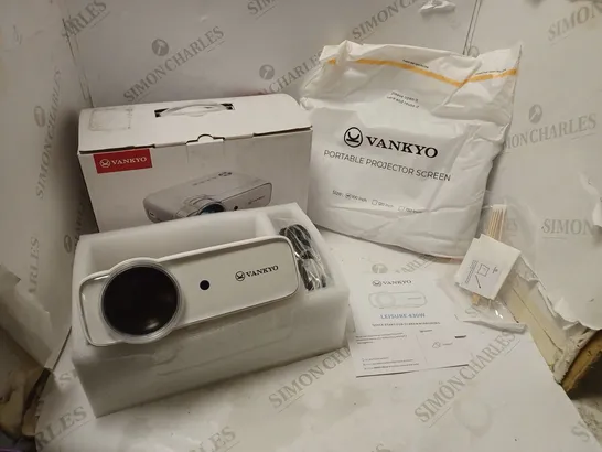 BOXED VANKYO PORTABLE PROJECTOR AND SCREEN WITH ACCESSORIES , CABLES AND MANUAL 