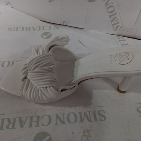 BOXED PAIR OF ERYNN CLEAR VISIONS WHITE PLEATED KNOT HEELS - SIZE 37