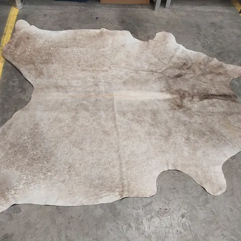 ONE-OF-A-KIND HAND KNOTTED CHAMPAGNE COWHIDE RUG // 170 X 210CM