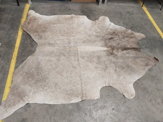 ONE-OF-A-KIND HAND KNOTTED CHAMPAGNE COWHIDE RUG // 170 X 210CM