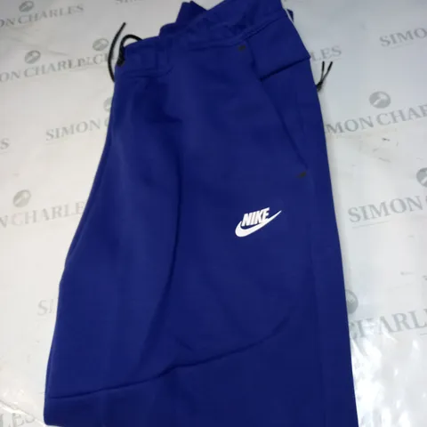 NIKE SLIM FIT TAPER LEG TRACKSUIT BOTTOMS SIZE L