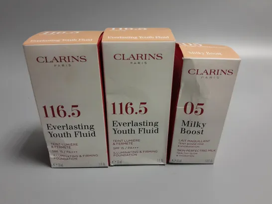 LOT OF 3 CLARINS BEAUTY ITEMS INCLUDES 2 116.5 COFFEE FOUNDATIONS AND MILKY BOOST 