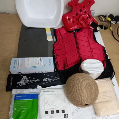 LARGE QUANTITY OF ASSORTED HOUSEHOLD ITEMS TO INCLUDE HEAD GUARD, MINI CAMPING TRIPOD AND WINDOW WEATHER STRIPPING