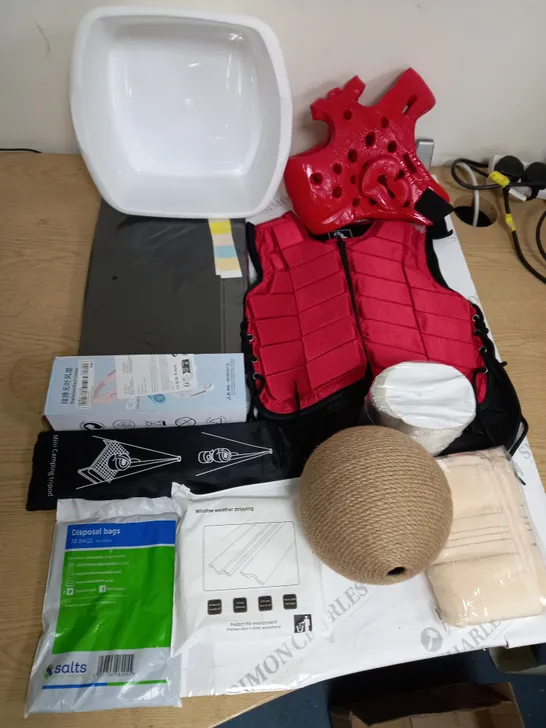 LARGE QUANTITY OF ASSORTED HOUSEHOLD ITEMS TO INCLUDE HEAD GUARD, MINI CAMPING TRIPOD AND WINDOW WEATHER STRIPPING