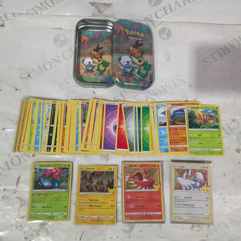 LOT OF ASSORTED POKÉMON TRADING CARDS W. TIN