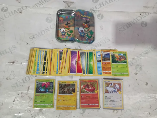 LOT OF ASSORTED POKÉMON TRADING CARDS W. TIN