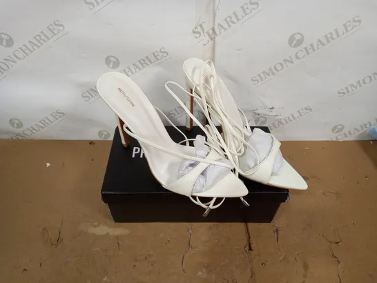 BOXED PAIR OF PRETTY LITTLE THING WHITE HIGH HEEL SANDALS SIZE 6