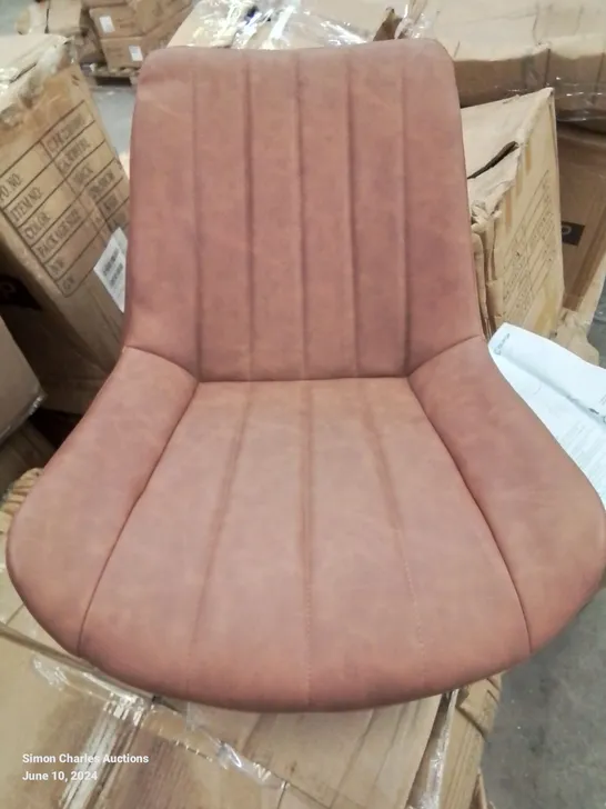 A BOXED PAIR OF BROWN FAUX LEATHER UPHOLSTERED DINING CHAIRS