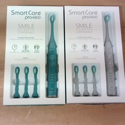 LOT OF 2 ASSORTED SMART CARE PRO4800 ELECTRIC TOOTHBRUSHES