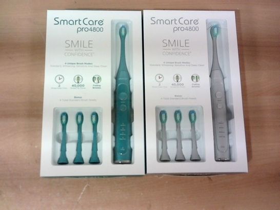 LOT OF 2 ASSORTED SMART CARE PRO4800 ELECTRIC TOOTHBRUSHES