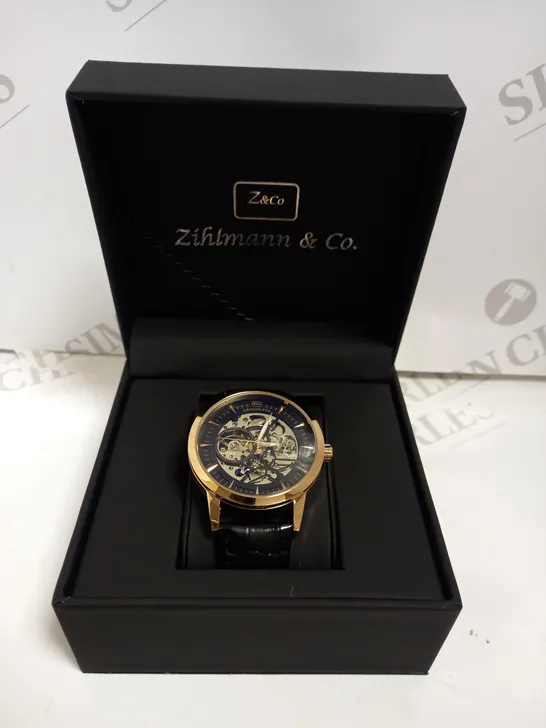 MENS ZIHLMANN & CO AUTOMATIC WATCH - Z210 – SKELETON DIAL – GOLD COLOUR CASE – GENUINE LEATHER CASE – HAND ASSEMBLED. 