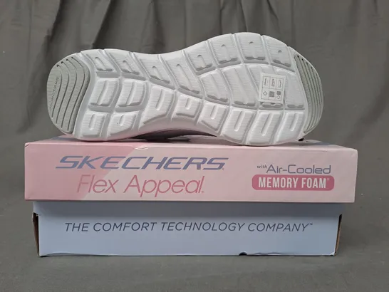 BOXED PAIR OF SKECHERS SHOES IN WHITE/METALLIC SILVER UK SIZE 4