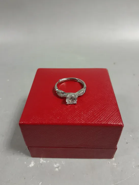 DESIGNER STONE TOPPED INFINITY RING 