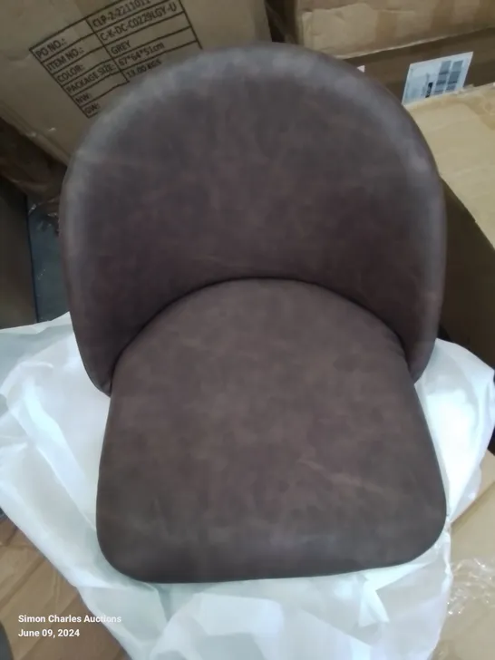 A BOXED PAIR OF BROWN FAUX LEATHER KITCHEN STOOLS