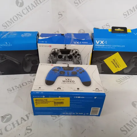 FOUR BOXED VX4 PS4 VIDEO GAME CONTROLLERS INCLUDING BLACK, BLUE AND CAMO PRINT