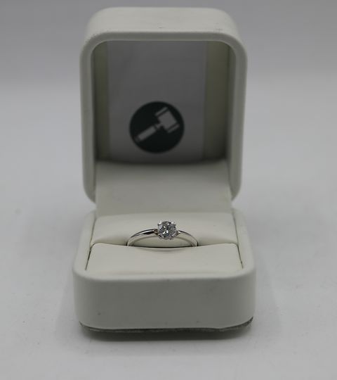 18CT WHITE GOLD SOLITAIRE RING SET WITH A DIAMOND WEIGHING +0.61CT