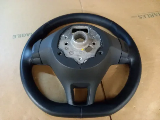 AUTOMOBILE STEERING WHEEL WITH PADDLES