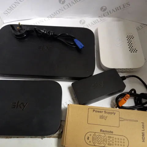 LOT OF SKY HOME NETWORKING ITEMS TO INCLUDE SET TOP BOX AND HUBS