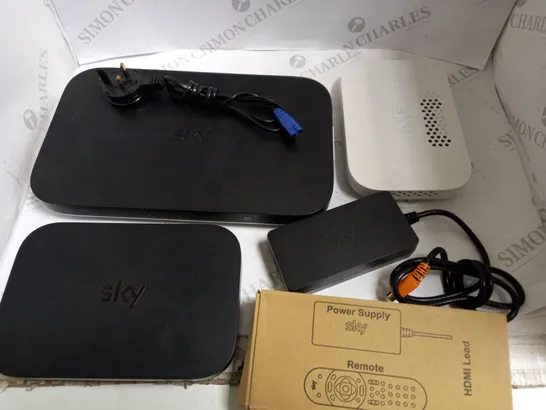 LOT OF SKY HOME NETWORKING ITEMS TO INCLUDE SET TOP BOX AND HUBS