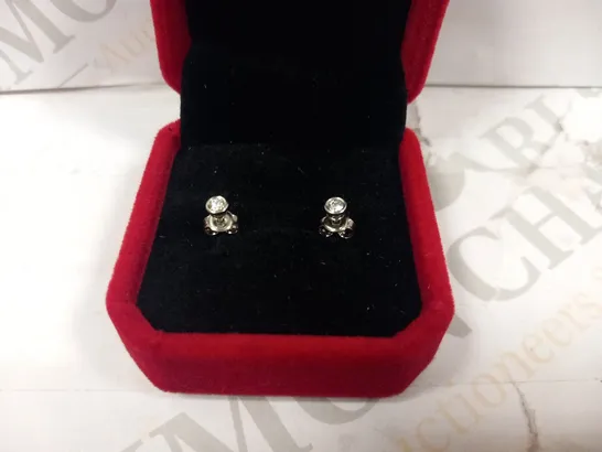 PLATINUM RUBOVER STUD EARRINGS SET WITH DIAMONDS, WEIGHING +0.14CT