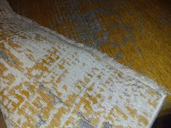 MUSTARD AND LIGHT GREY CARPET WITH A WHITE TRIM 