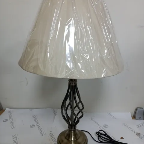 TWISTED TABLE LAMP IN ANTIQUE BRASS COLOUR