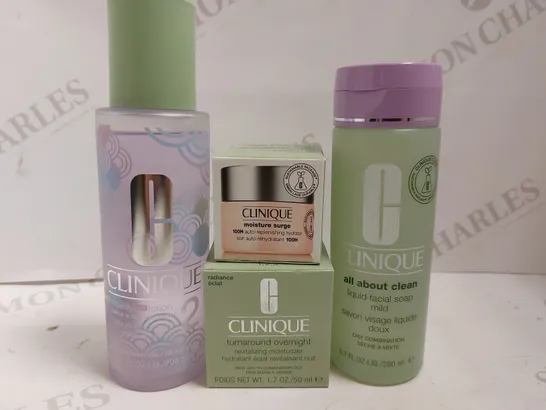 BOX OF 4 CLINQUE ITEMS TO INCLUDE MOISTURE SURGE, TURNAROUND OVERNIGHT CREAM, CLARIFYING LOTION