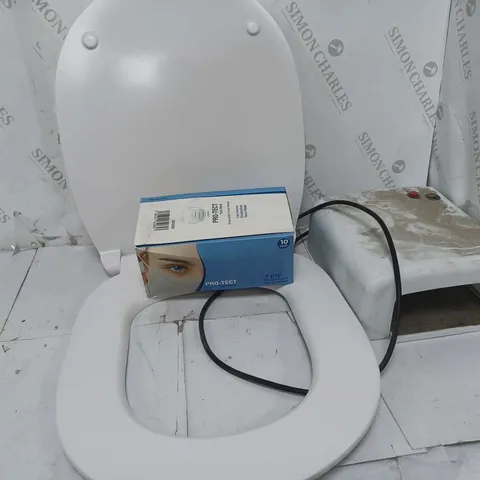 APPROXIMATELY 6 ASSORTED TOILETRY ITEMS TO INCLUDE IDEAL STANDARD TOILET SEAT, FACE MASKS, MULTIFOLD HAND TOWEL DISPENSER, ETC - COLLECTION ONLY