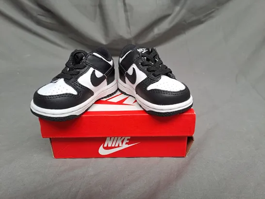 BOXED PAIR OF NIKE DUNK LOW SHOES IN WHITE/BLACK SIZE 2.5