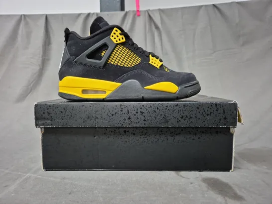 BOXED PAIR OF NIKE AIR JORDAN 4 RETRO SHOES IN BLACK/YELLOW UK SIZE 6