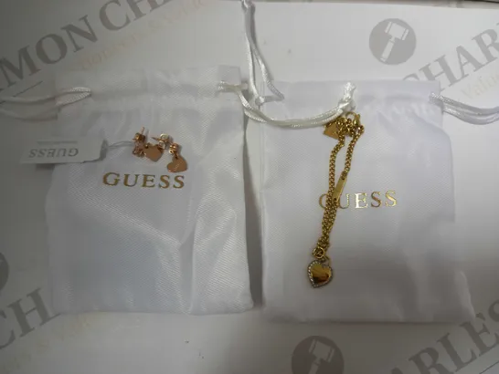 BOX OF 2 GUESS ITEMS TO INCLUDE HEART TO HEART LADIES ROSE GOLD EARRINGS AND FINE HEART BRACELET RRP £78