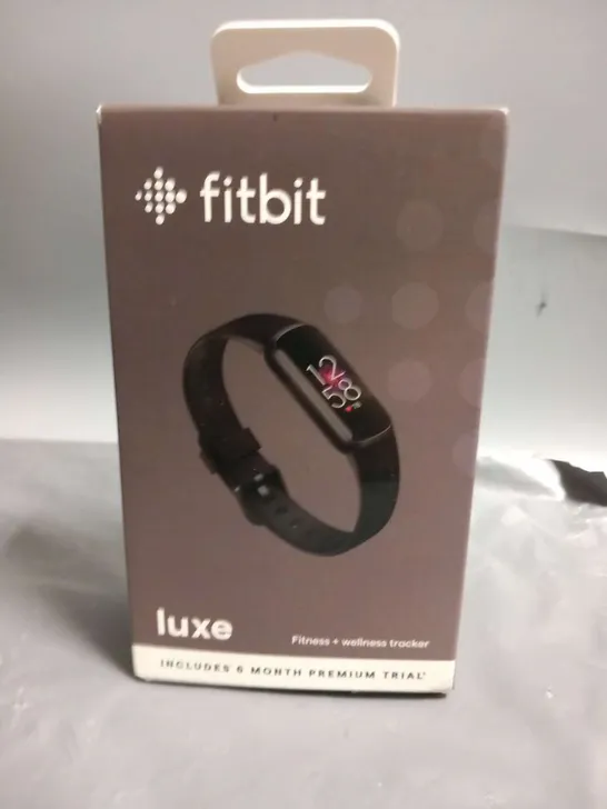 BOXED FITBIT LUXE FITNESS AND WELLNESS TRACKER