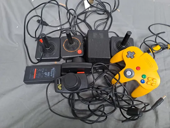 LARGE QUANTITY OF ASSORTED ELECTRICALS TO INCLUDE ATARI POWER SUPPLY, NINTENDO N64 CONTROLLER, SONY AC-ADAPTER  