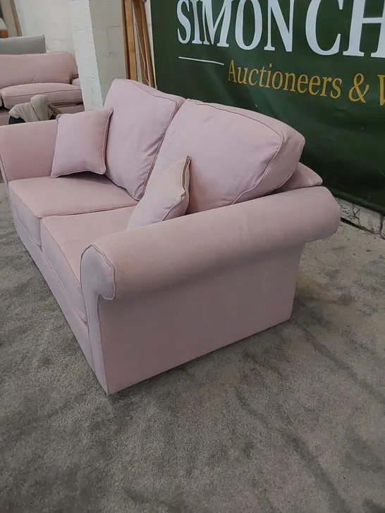 THE LANGRIDGE 2 SEATER SOFA BED IN UPHOLSTERED PINK FABRIC