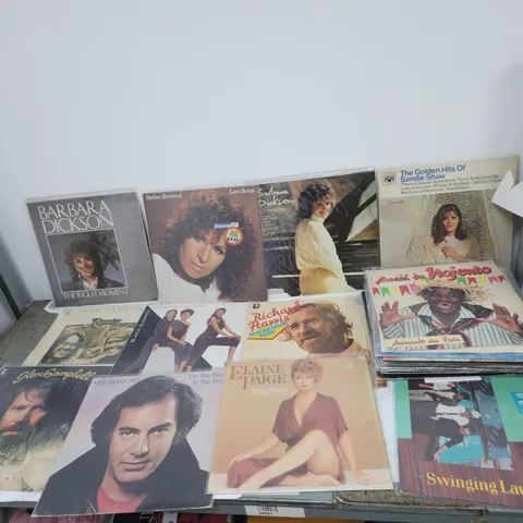 A COLLECTION OF 35 X VINYL RECORDS. MAINLY 60S 70S 80S.