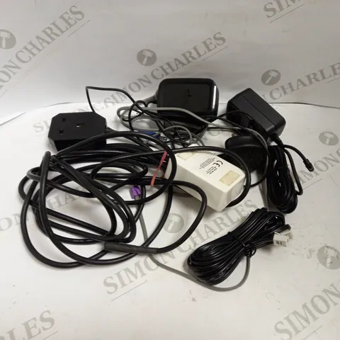 LOT OF ASSORTED POWER CABLES AND CONNECTORS TO INCLUDE LAPTOP CHARGERS, LANDLINE CABLES, SKY BOX CABLES, ETC