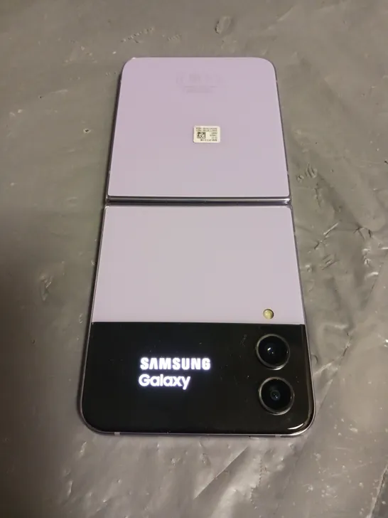 UNBOXED SAMSUNG GALAXY FOLDING PHONE IN PURPLE - 128GB SM-F721B