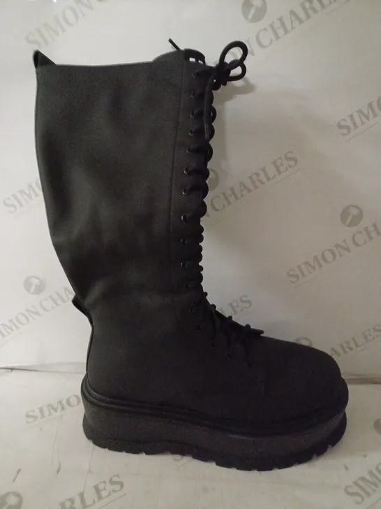 BOXED PAIR OF KOI WOMEN'S PLATFORM BLACK LACE UP BOOTS SIZE 6