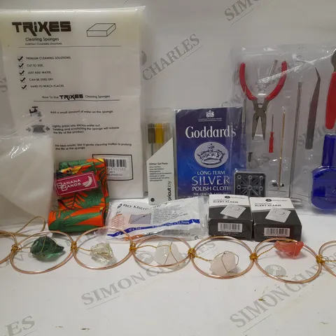 LOT OF APPROX 8 ASSORTED HOUSEHOLD ITEMS TO INCLUDE BANANA BANDS, GLITTER GEL PENS, DEFENDER WINDOW ALERT ALARMS, ETC