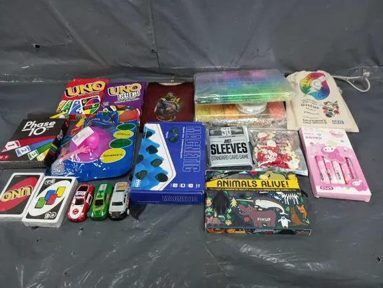 BOX OF ASSORTED TOYS AND GAMES TO INCLUDE CARD GAMES, UNO AND MAGNETS