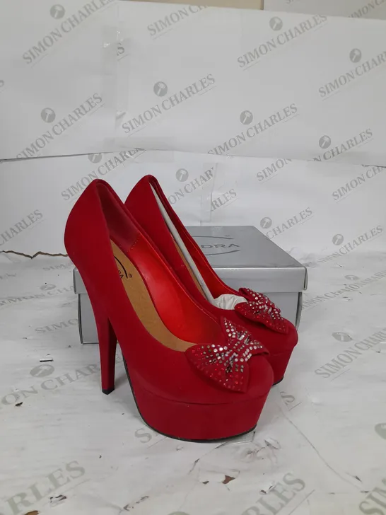 BOXED PAIR OF CASANDRA PLATFORM STILETTO HEEL IN RED SUEDE WITH RHINESTONE BOW DETAIL SIZE 4