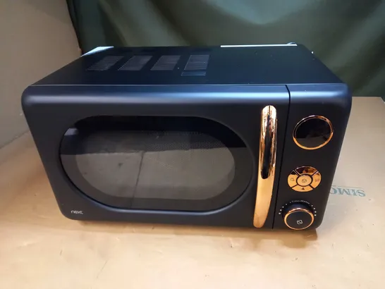 BLACK AND COPPER MICROWAVE 