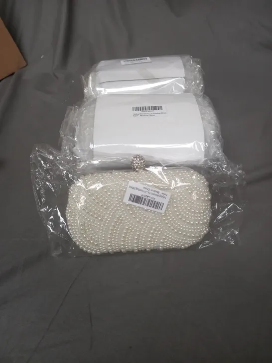 A BOX OF 5 ASSORTED TSKYBAG HANDBAGS IN WHITE WITH PEARL EFFECT