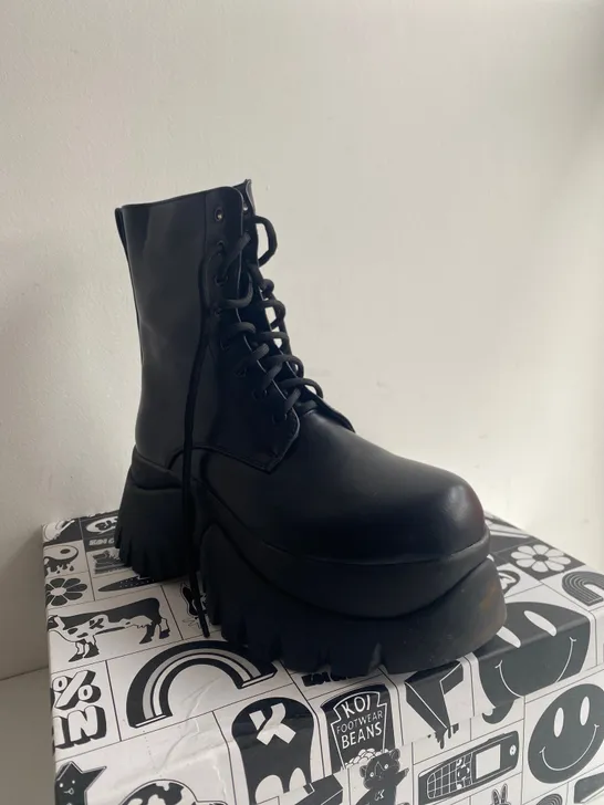 BOXED PAIR OF KOI RANCOR VILUN BLACK LACE-UP BOOTS SIZE 5