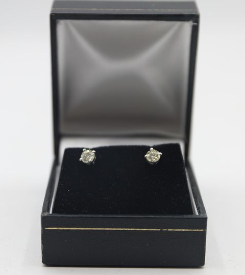 18CT WHITE GOLD STUD EARRINGS SET WITH DIAMONDS WEIGHING 0.53CT